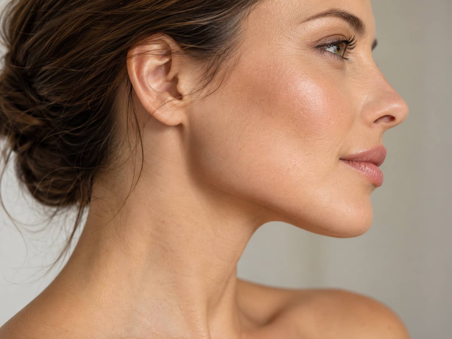 Woman's smooth jawline and lower face showing anti-wrinkle injections treatment areas